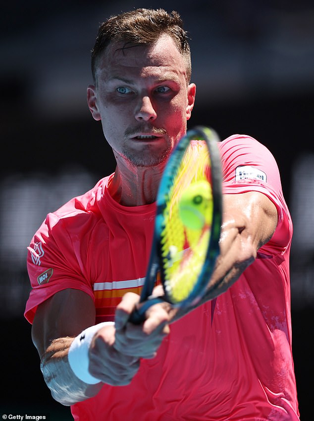 Marton Fucsovics donned this pink shirt after being told the top he wore during warm-up broke tournament rules