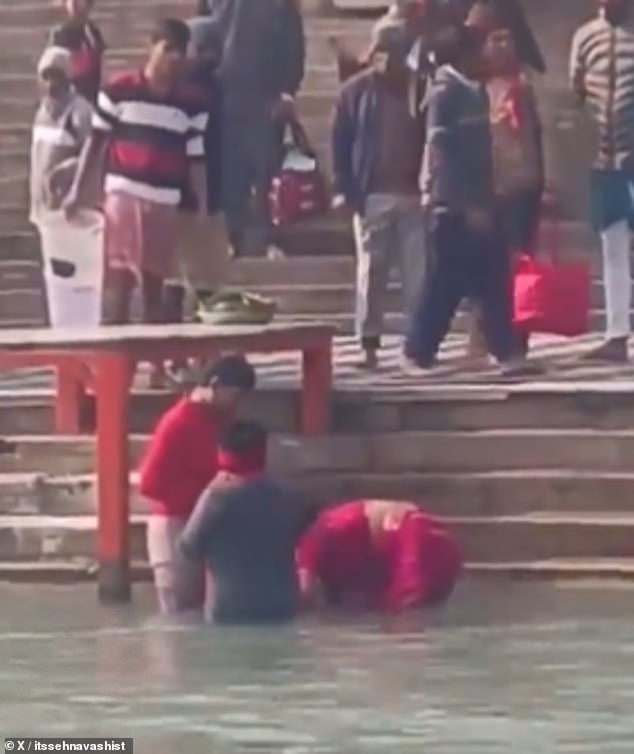 Bystanders watched as the family held the child underwater in the hope of finding a 'miracle cure'