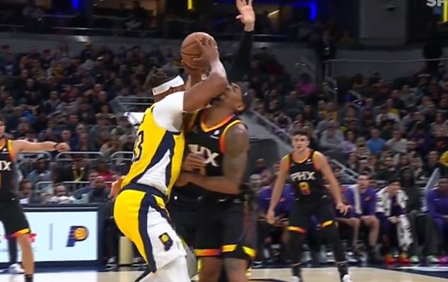 Bradley Beal was hit in the face by an extremely hard elbow from Myles Turner