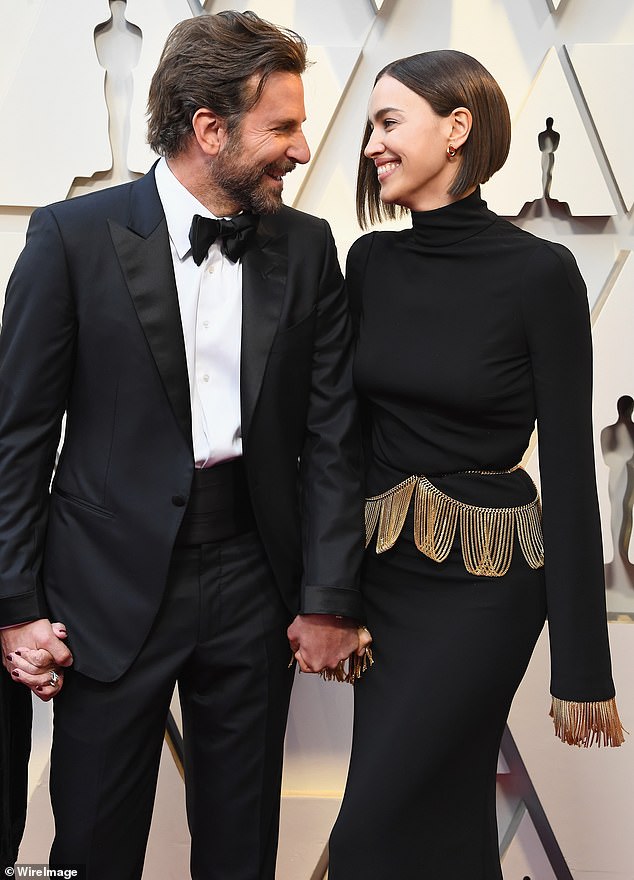 HOLLYWOOD'S GOLDEN BOY: Bradley Cooper and his then-partner Irina Shayk attend the Oscars 2019 in Hollywood