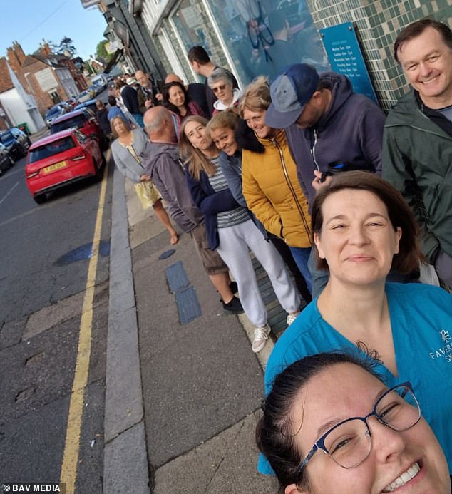 Last year, Leigh, in Greater Manchester, joined a growing list of communities where struggling patients were queuing from dawn to access a dentist.  It follows reports from Faversham, in Kent, where one practice received 27,000 calls for just 60 NHS slots.  Pictured is the queue outside Faversham Smiles dental practice in August 2023