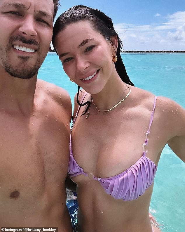 Brittany Hockley doesn't want her luxury getaway to the Maldives to end.  Pictured next to Swiss football star Benjamin Siegrist