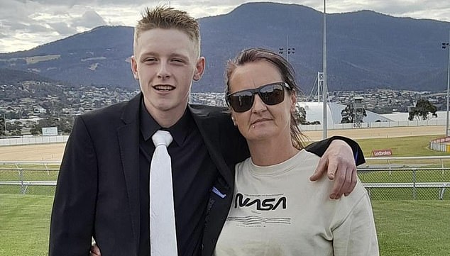 Brock Triffitt, 16, was out with friends in the early hours of January 1 when he was dropped off on the Tasman Highway and hit by another car after being left behind by his friends.  He is pictured with his mother Sharon Douglas