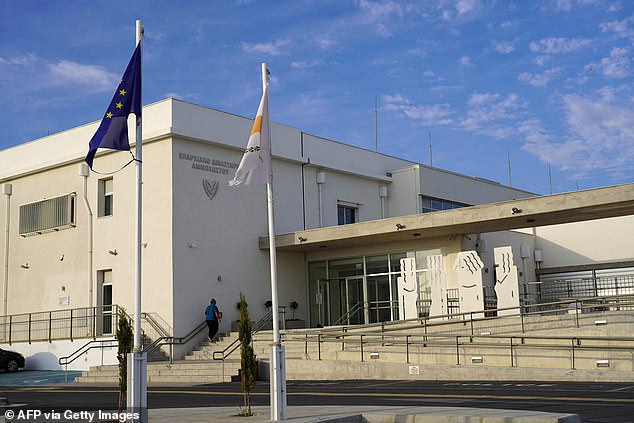 The Cypriot and European flags fly in front of the Famagusta court in Paralimni, where five Israeli tourists are on trial for the alleged gang rape of a British woman