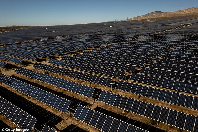 He proposed covering the financial shortfall by removing $13 billion from reserves, cutting $8.5 billion from programs, and shifting some spending into the future and spreading it over more years.  Pictured: Solar panels spread across the Mojave Desert