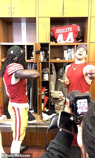 Brandon Aiyuk and Kyle Juszczyk shared a handshake as they celebrated the 49ers' win