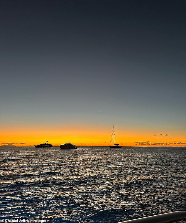 She shared a sunset photo of boats on the ocean