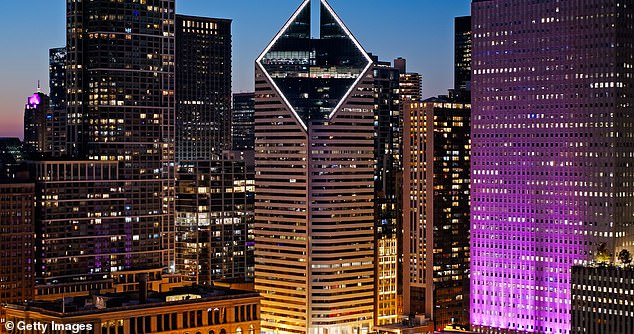 A Chicago office tower known to locals as the 'Vagina Building' has sold for just half its previous price of $121 million