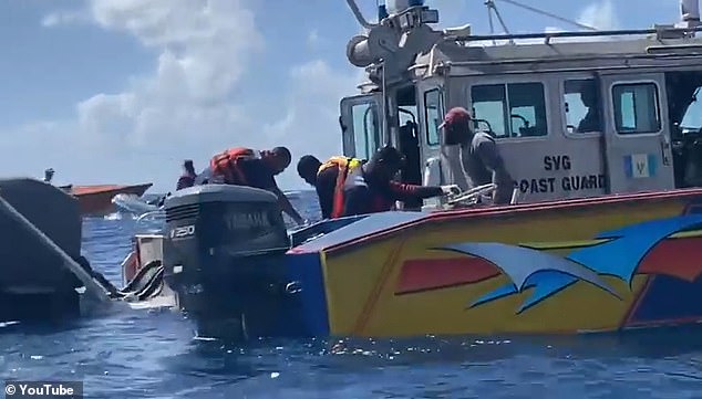 Members of the Sint-Vincentius Coast Guard are on site during the salvage operation