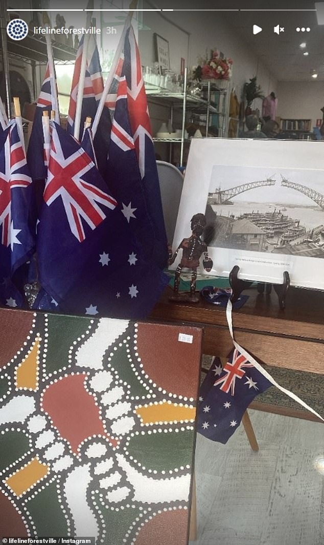 The store sold Australian flags just inches from an Aboriginal painting