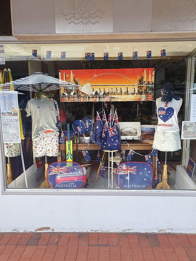 Australian flags, bunting, shirts and hats were on display at the front of the store (photo)