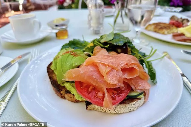 The $38 avocado toast served in the Polo Lounge features sourdough bread with smoked salmon and heirloom tomatoes