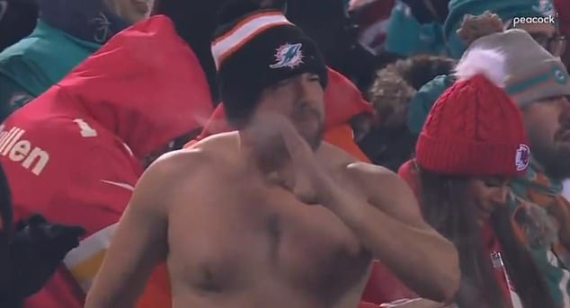 A Dolphins fan went viral after appearing shirtless in the frigid temperatures in Kansas City