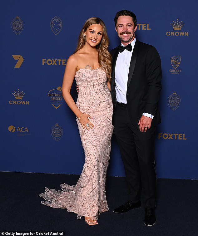 Travis Head and girlfriend Jessica Davies made a splash as she donned a stunning baby pink dress for the occasion