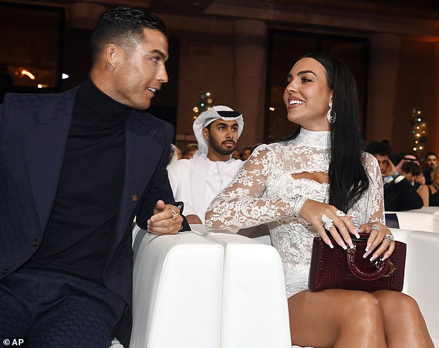 Ronaldo was joined by Georgina Rodriguez at the Globe Soccer Awards in Dubai this evening, with the pair smiling at each other as they took their seats