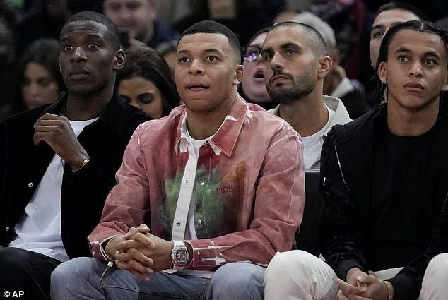 PSG forward Kylian Mbappe, 25, was also spotted on court during the NBA match in France