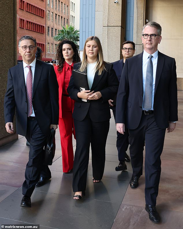 David Sharaz (rear, wearing glasses) arrives with his fiancée Brittany Higgins' legal team at the defamation trial of Bruce Lehrmann in December 2023. Mr Sharaz had spoken in his first pitch to The Project journalist Lisa Wilkinson about pursuing the 'Liberal Party Machine'.