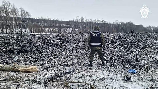 An investigator from the Russian Intelligence Committee is investigating the crash site where an Il-76 transport plane crashed earlier this week