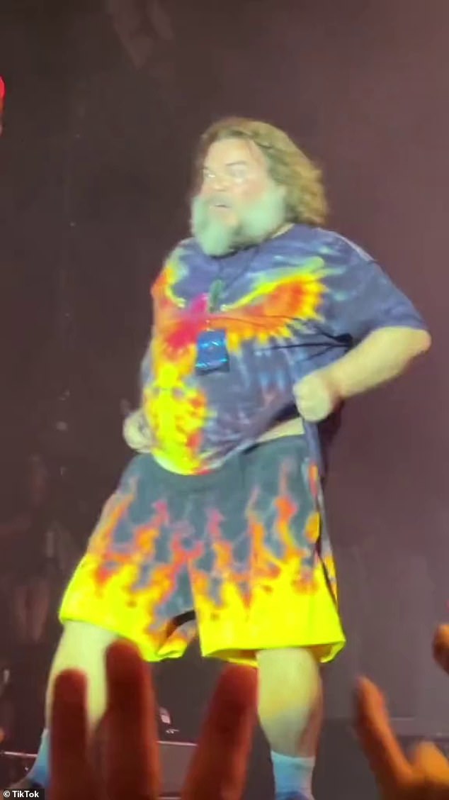 None other than movie star Jack Black, 54, (pictured) literally rolled into the Auckland show at Mt Smart Stadium wearing a bizarre tie-dye ensemble