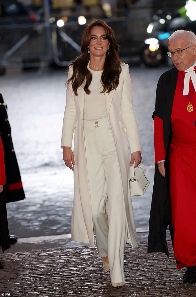 The Princess of Wales, 42, is recovering in hospital after a planned abdominal operation on Tuesday at the London Clinic in Marylebone.  It is understood that her condition is 'non-cancerous'.  But exact details have not been released by Kensington Palace, which announced the shocking news yesterday.  Pictured: Kate arriving for the Royal Christmas Carol Concert at Westminster Abbey on December 8 last year