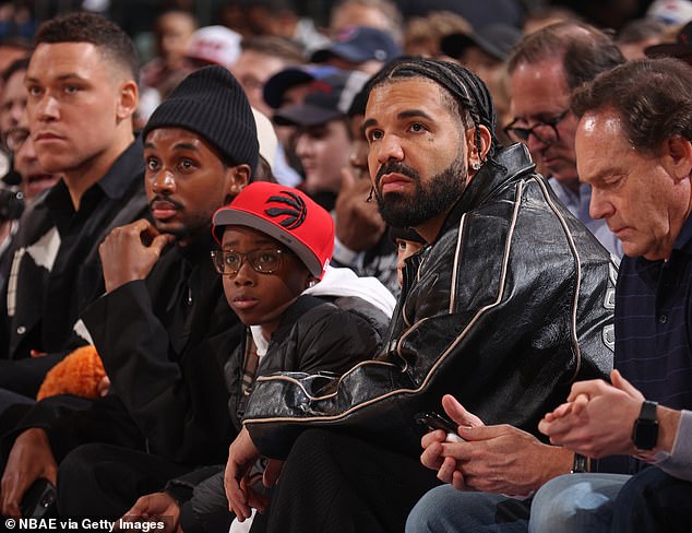 Drake and Judge sat just feet apart in the front row of MSG