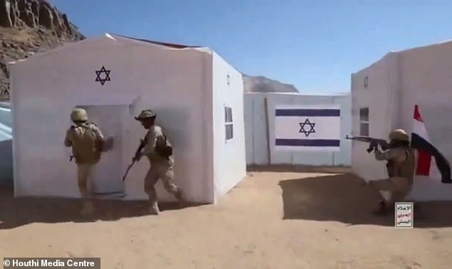 Footage showed troops storming a makeshift complex with Israeli flags