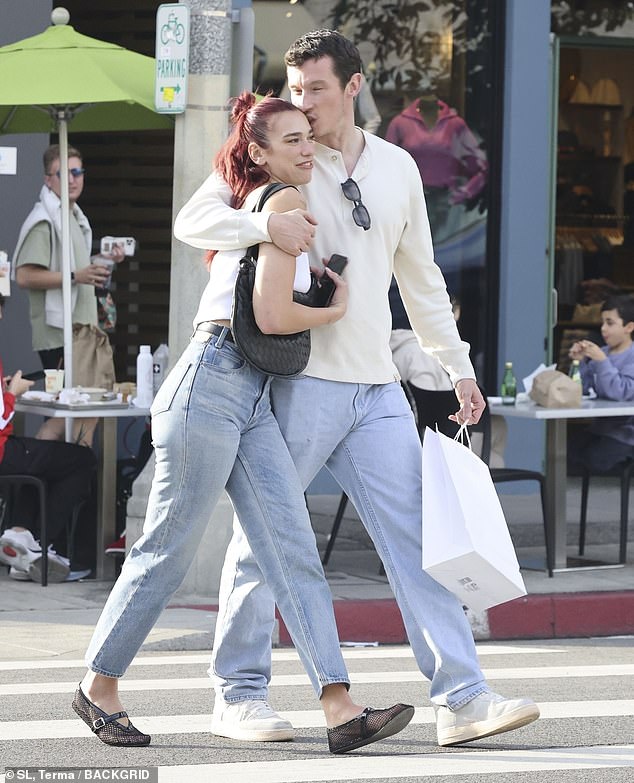 Dua Lipa, 28, packed on the PDA with her boyfriend Callum Turner, 33, as they enjoyed an amorous outing in Beverly Hills on Tuesday