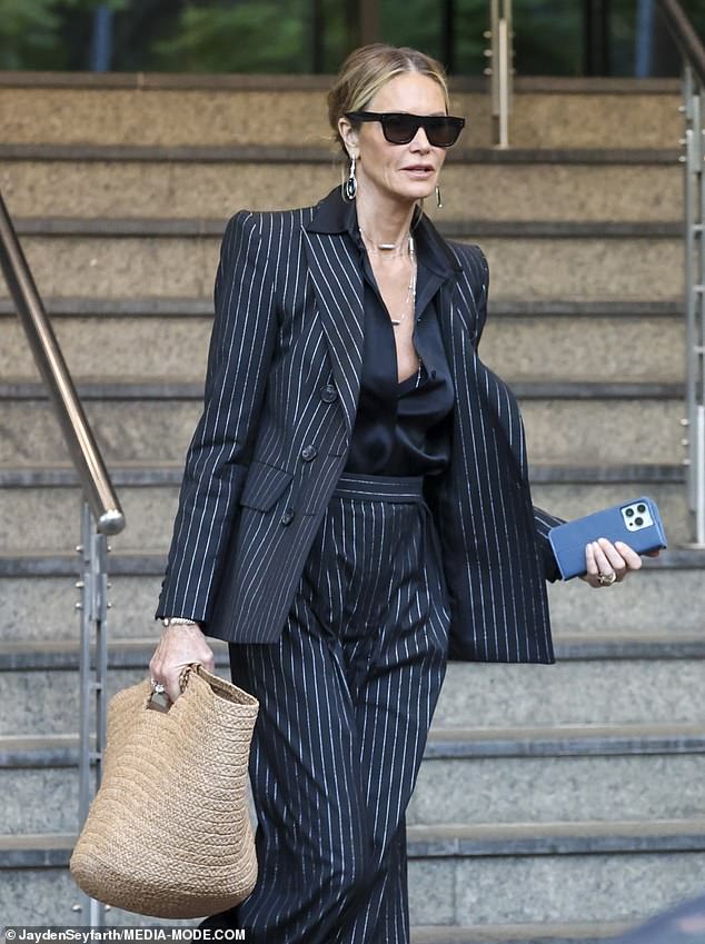 The 59-year-old model stepped out of Sydney's Channel Ten Studios in a chic pinstripe suit after her interview on The Sunday Project