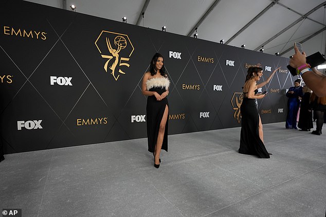 Guests take photos on the red carpet prior to arriving for the 75th Primetime Emmy Awards on Monday, January 15, 2024 at the Peacock Theater in Los Angeles