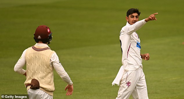 Bashir (pictured in action for Somerset) remains on the ground in the United Arab Emirates