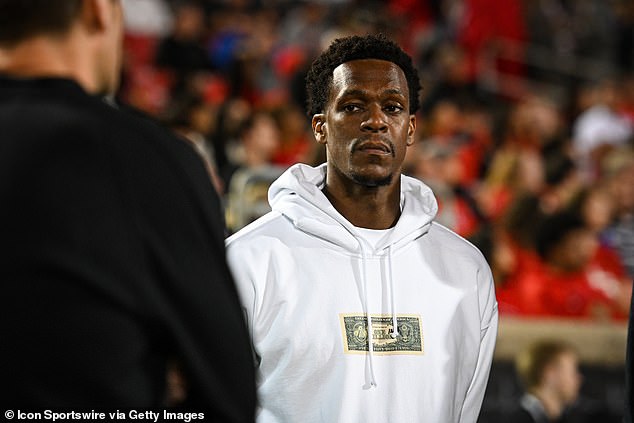 Former NBA guard Rajon Rondo (pictured in 2022) was arrested on gun and drug charges