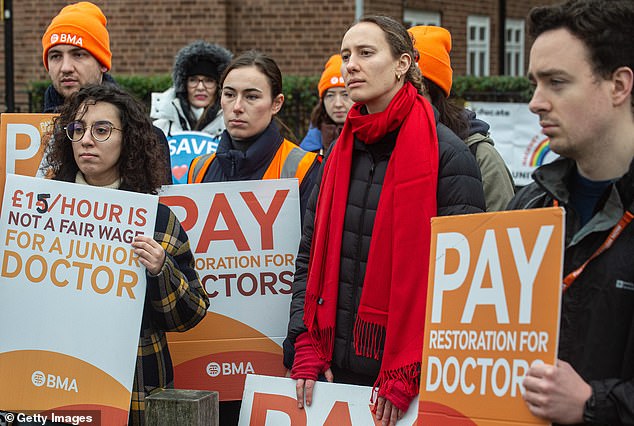 The BMA said trainee doctors' salaries have been cut by more than a quarter since 2008, and is demanding a path to full pay recovery - an increase of around 35 per cent.  (Image: Trainee doctors strike in London on Thursday)