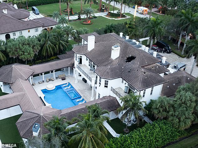 A huge hole can be seen in the roof of Tyreek Hill's Southwest Ranches mansion in Florida