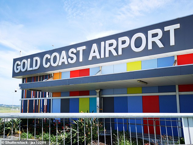 There were chaotic scenes at Gold Coast Airport (pictured) on New Year's Eve as a Victorian woman was arrested after allegedly assaulting airline staff