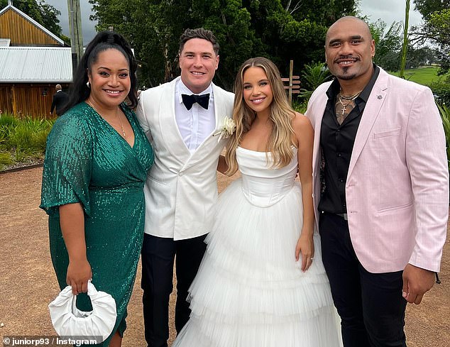 The newlyweds are pictured with Eel's powerhouse Junior Paulo and his wife Mele