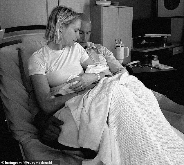 Melbourne Demons veteran Tom McDonald and his wife Ruby are devastated after their daughter Goldie (pictured together) was stillborn