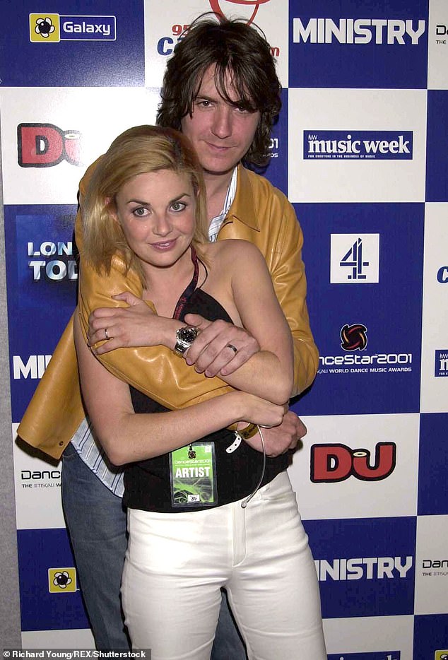 The presenter was at the height of her career when she was diagnosed with alopecia, presenting shows including Top Of The Pops, Children In Need and The Big Breakfast (pictured with ex-husband Dan Hipgrave in 2001)