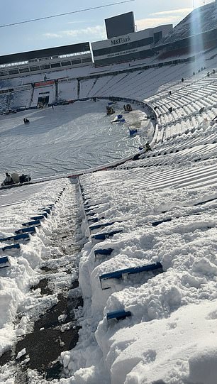 After a massive winter storm, deep snow is still covering the stands and walkways of Orchard Park