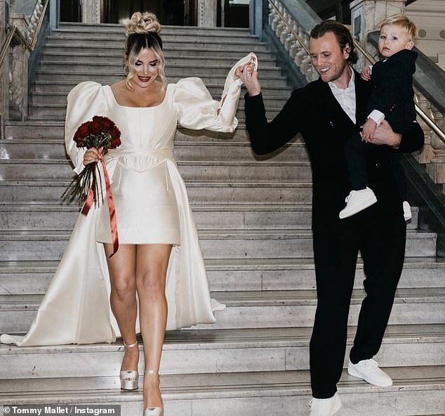 Georgia Kousoulou has made Tommy Mallet 'sign a contract' to ensure he comes to their wedding in Spain (pictured at their intimate wedding in London last month)