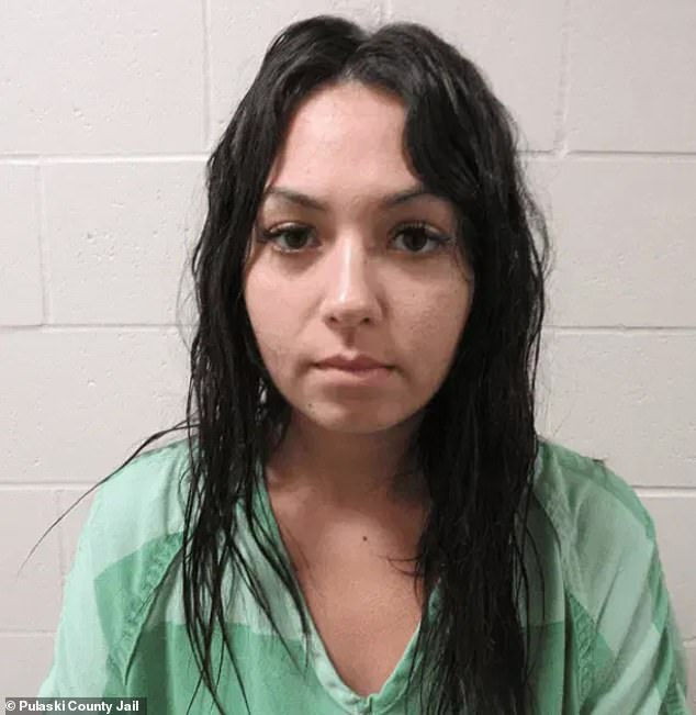 A new mugshot details how Hailey Nichelle Clifton-Carmack, 26, was booked into the Pulaski County Jail early this week after being released from the Comal County Jail in Texas