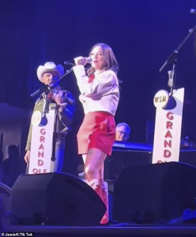 The Grand Ole Opry on Friday to a concertgoer who regretted the profanity singer Elle King, 34, used in her performance at the iconic Nashville venue at the Ryman Auditorium on Friday during a show honoring Dolly Parton who turned 78