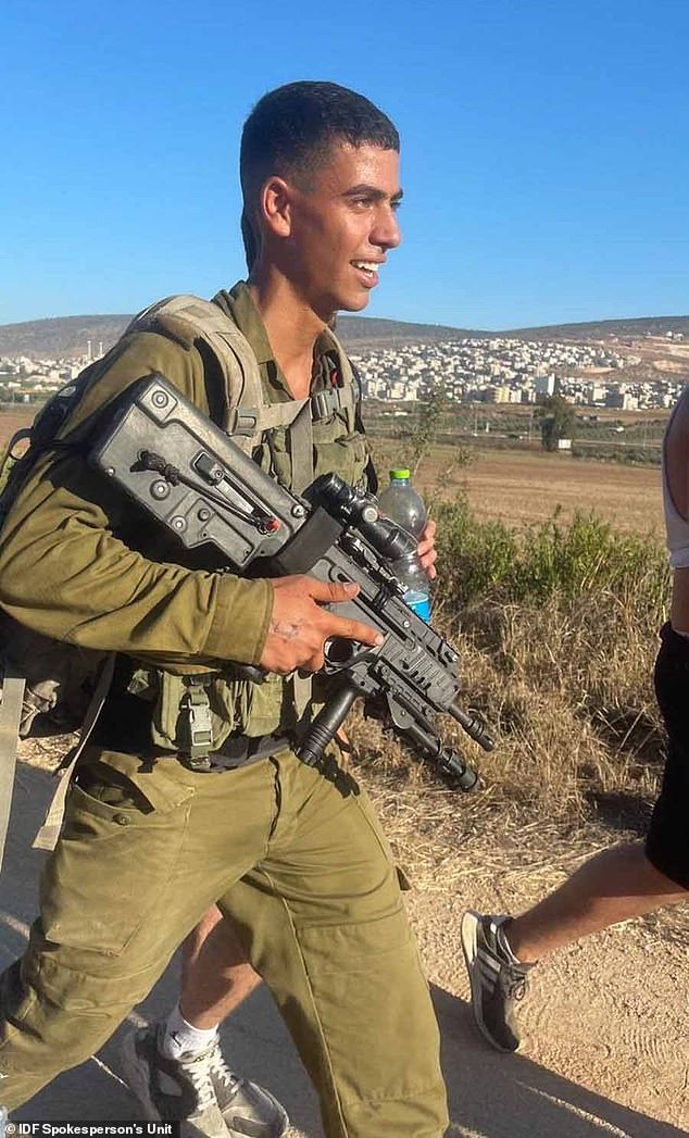 Sergeant Adir Tahar, 19, (pictured) from Jerusalem, was killed by the terrorists after they threw grenades at him as they rampaged through southern Israel, slaughtering 1,200 Israelis