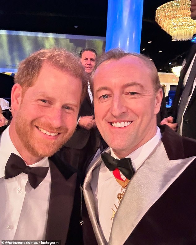 Prince Harry was all smiles as he posed for a selfie with Prince Mario-Max Schaumburg-Lippe at the Living Legends of Aviation in Los Angeles on Friday evening