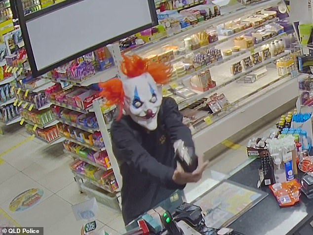 Police have arrested a 39-year-old man after investigating an armed robbery at a petrol station in Brisbane's south on December 29 (pictured shows footage of the incident).