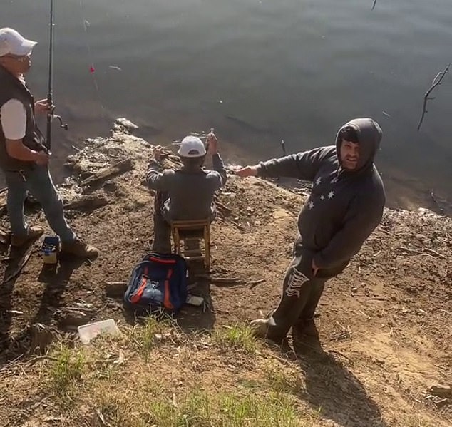 A heated confrontation has broken out between a TikTokker and a man who is harassing two fishermen to leave because they are 'Chinese' and can't fish in Australian waters