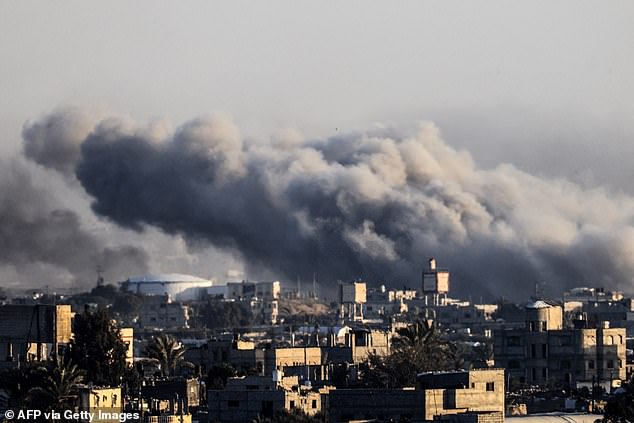 This photo taken on January 22, 2024 from Rafah shows clouds of smoke during the Israeli bombardment of Khan Younis in the southern Gaza Strip