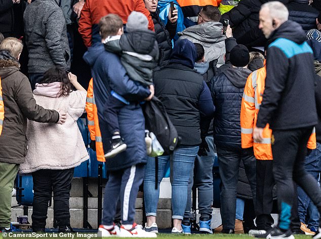 West Brom fan Liam Dunn (left) has thanked two Wolves players for checking on his son