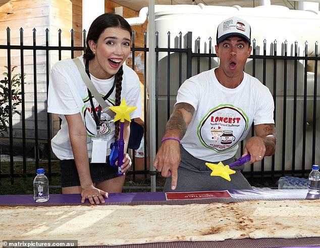 Also in attendance were Blue Wiggle Anthony Field's daughter Lucia (left) and Purple Wiggle John Pearce (right), who pulled off some animated poses next to the pizza dough