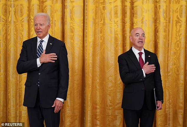 Homeland Security Secretary Alejandro Mayorkas (right) and President Joe Biden face an impeachment vote in the House of Representatives over his handling of the border crisis