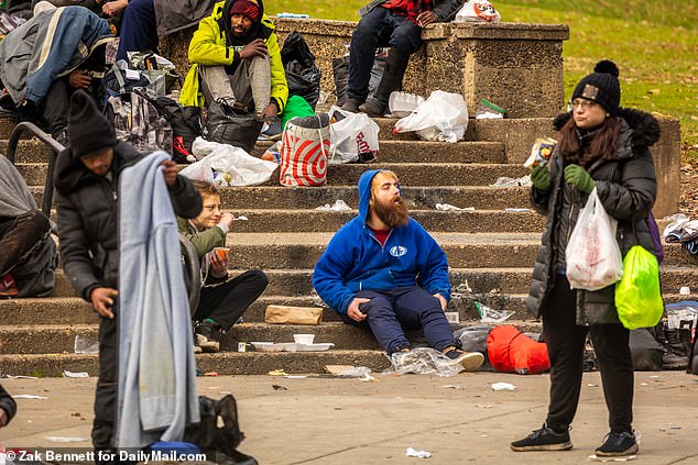 Drug users are depicted stretched out in the park, waiting for their next fix.  The city of Philadelphia is struggling to cope with the increase in xylazine use